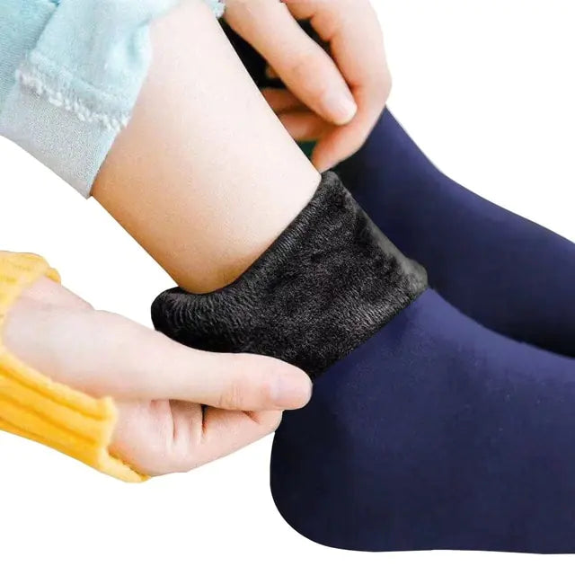 Get the best in coziness and warmth this winter with our Thickened Socks by Men Women Socks!