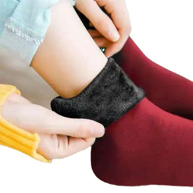 Get the best in coziness and warmth this winter with our Thickened Socks by Men Women Socks!