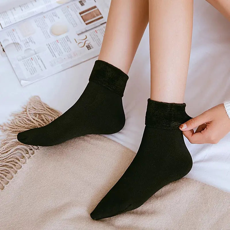 Get the best in coziness and warmth this winter with our Thickened Socks by Men Women Socks!